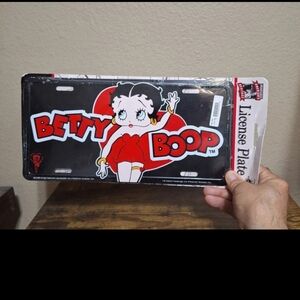 Vintage 2000 Betty Boop Waving & Wearing A Red Dress Black License Plate